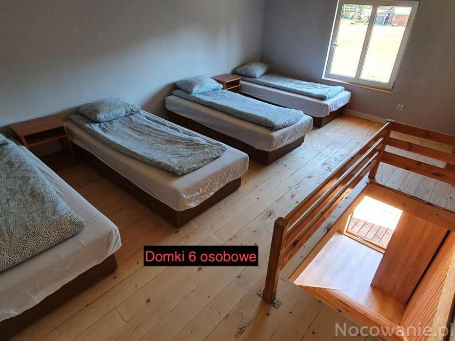 Domki Pod Lasem Мжежино Экстерьер фото
